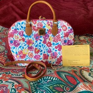 Lovely spring Dooney and Bourke hand bag with shoulder strap